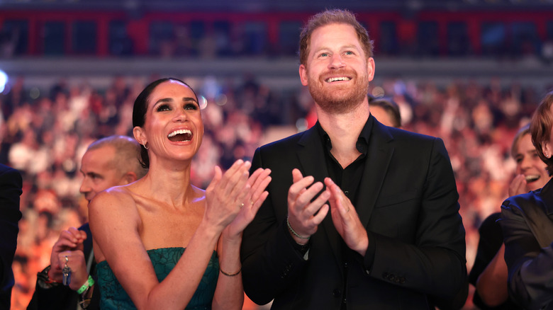 Harry and Meghan smiling