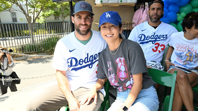 A couple at a baseball game