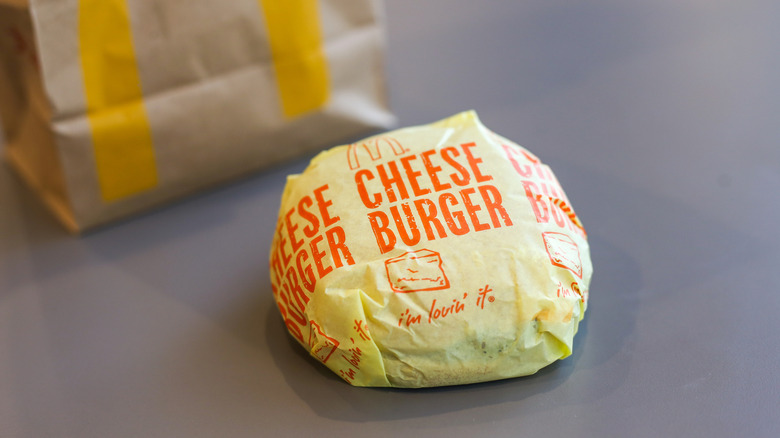 wrapped McDonald's cheeseburger