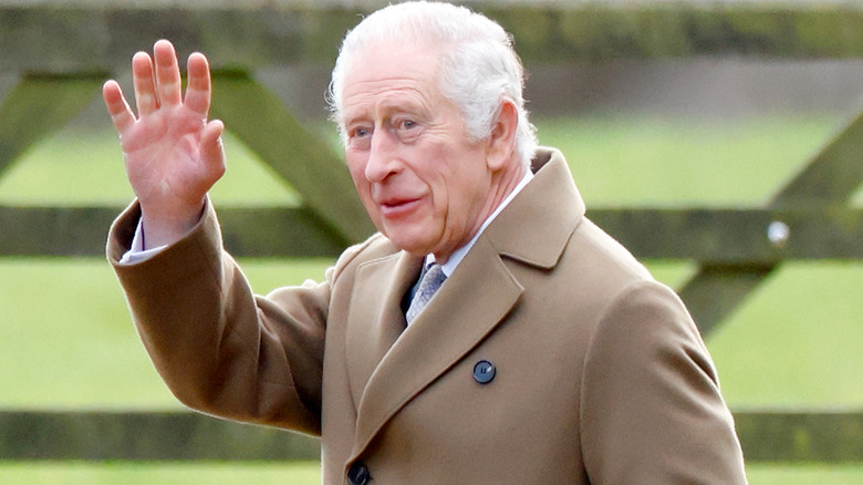 King Charles III waving