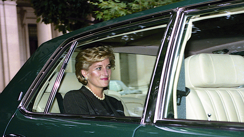 Princess Diana smiles in car