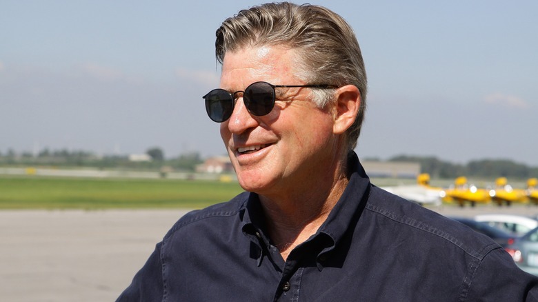 Treat Williams smiling and wearing sunglasses