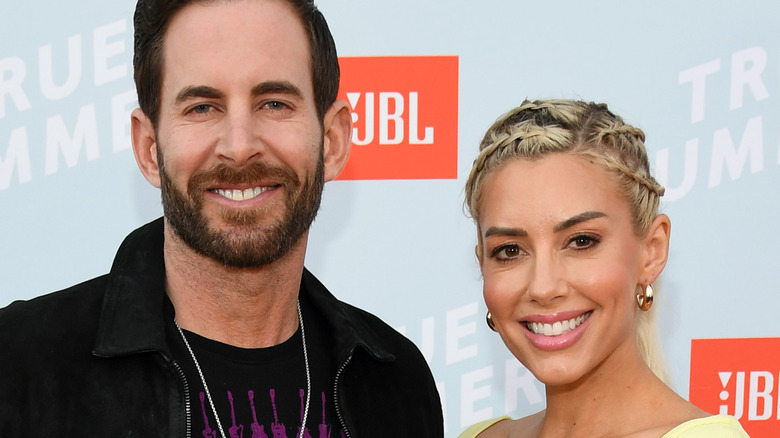 Heather Rae Young poses with husband Tarek El Moussa