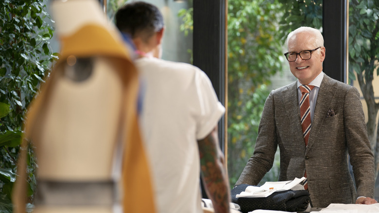 Tim Gunn mentoring a designer on Making the Cut