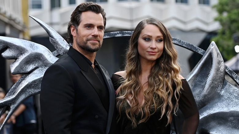 Henry Cavill and Natalie Viscuso posing