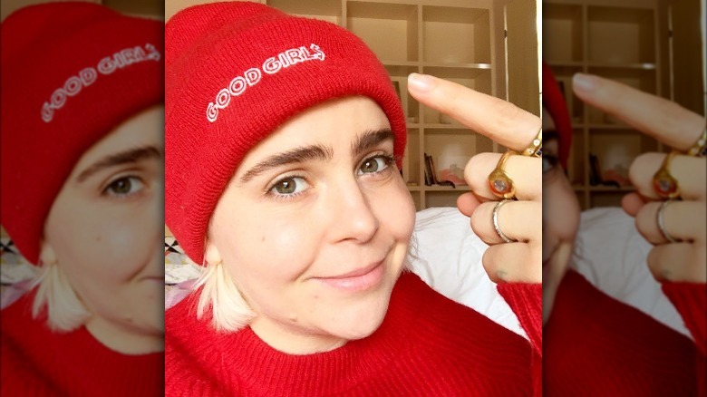 Mae Whitman pointing to hat