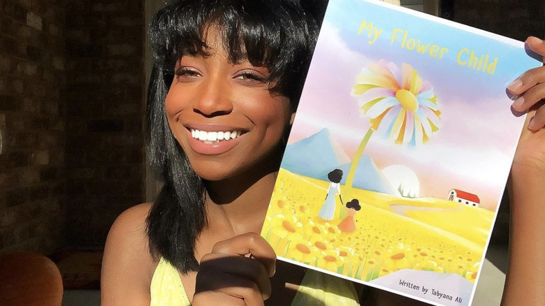 Tabyana Ali with My Flower Child book