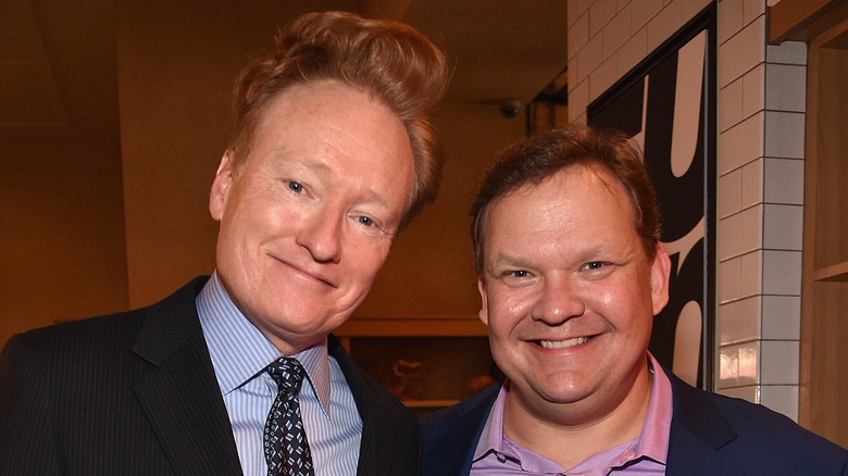 Andy Richter and Conan O'Brien smiling