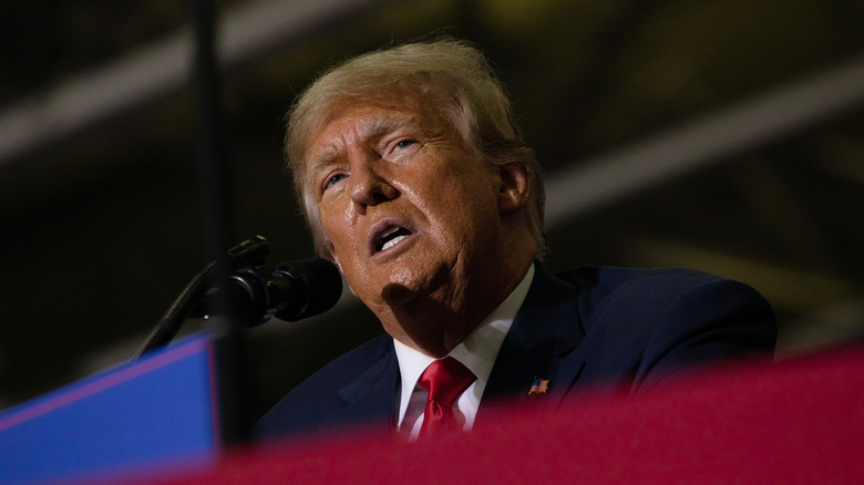 Donald Trump behind a lectern