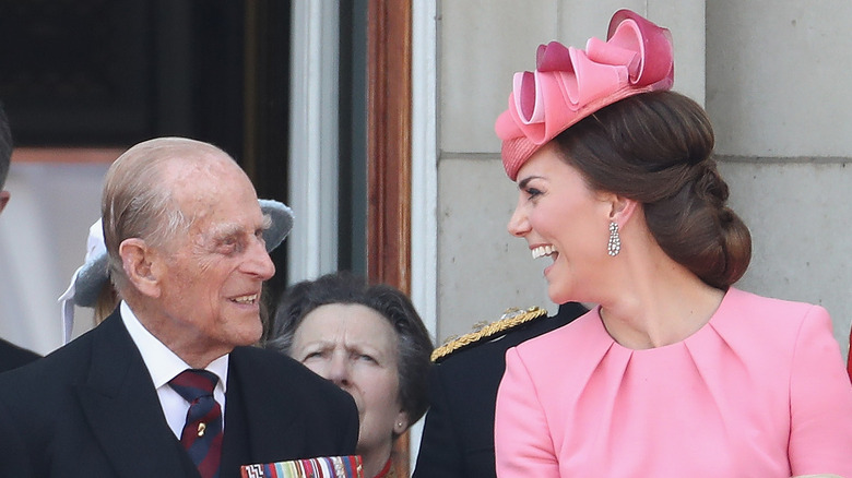 Kate Middleton with laughing and smiling with Prince Philip