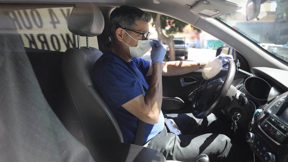 Masked Lyft driver