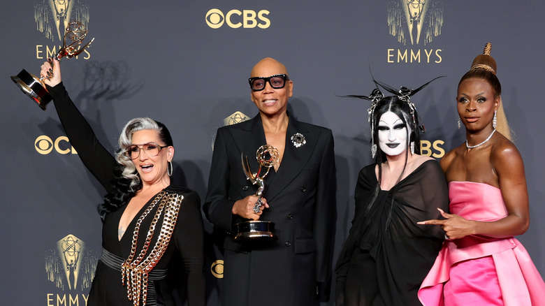 RuPaul, Michelle Visage, Gottmik and Symone pose with their Emmys