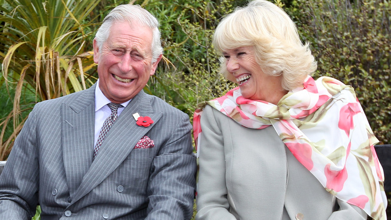 Prince Charles and Camilla Parker Bowles laughing