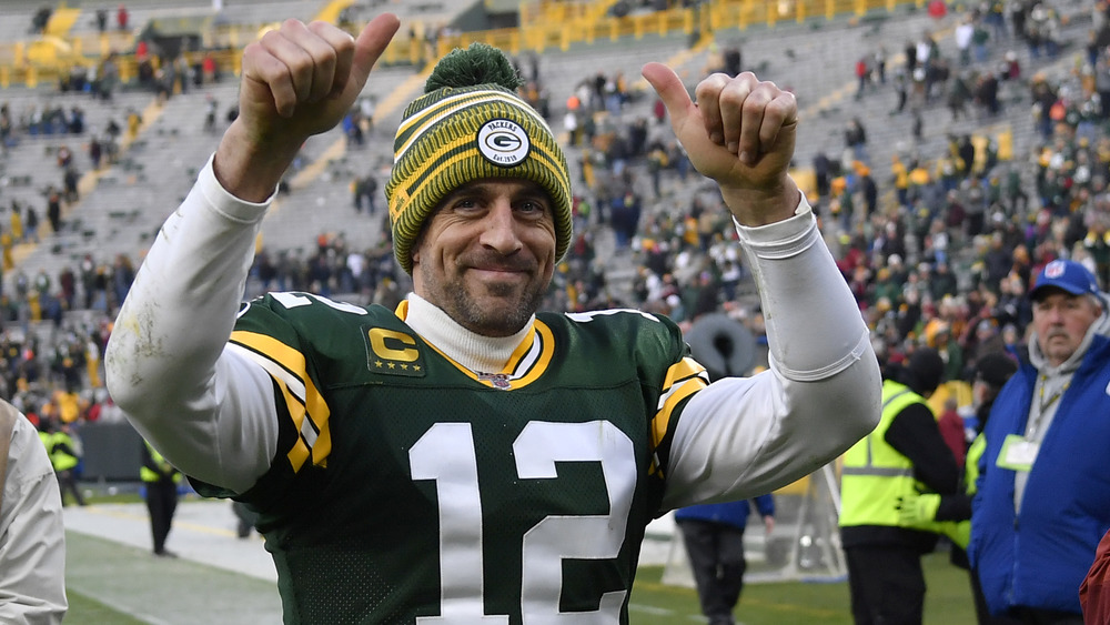 Aaron Rodgers gives the thumbs up to the camera 