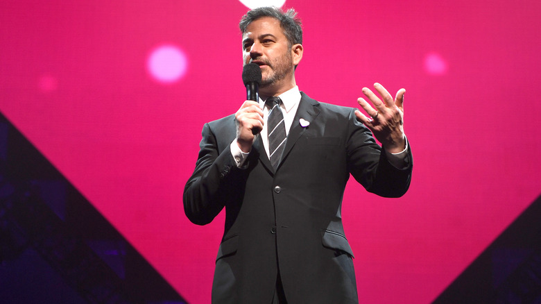 Jimmy Kimmel speaking in a microphone