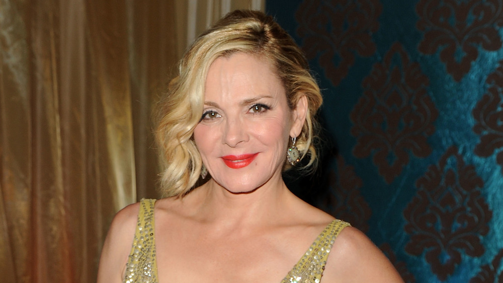 Kim Cattrall poses at an event