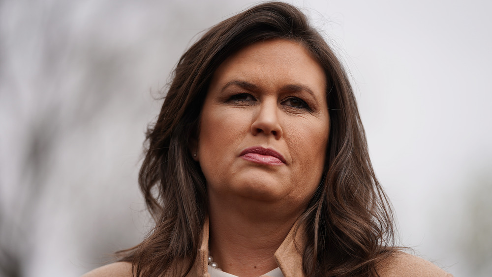 Sarah Huckabee Sanders wears tan