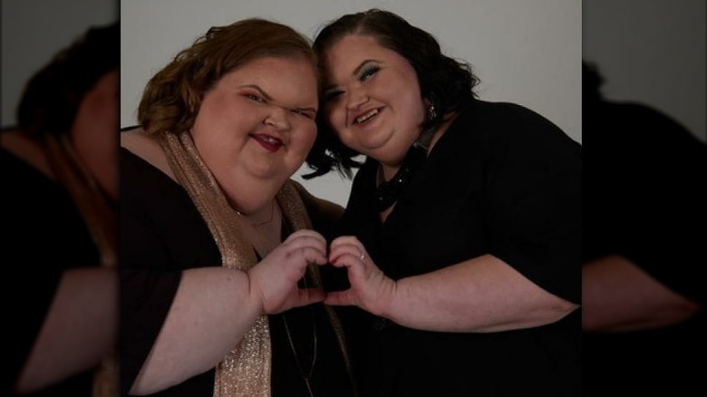 Tammy and Amy Slaton making heart