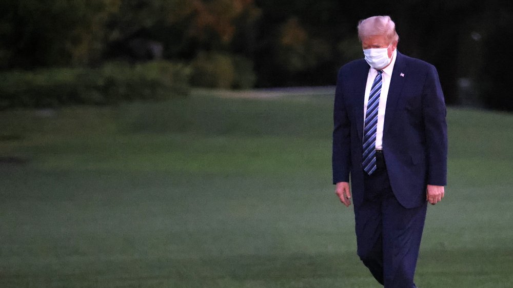 Donald Trump walking to chopper