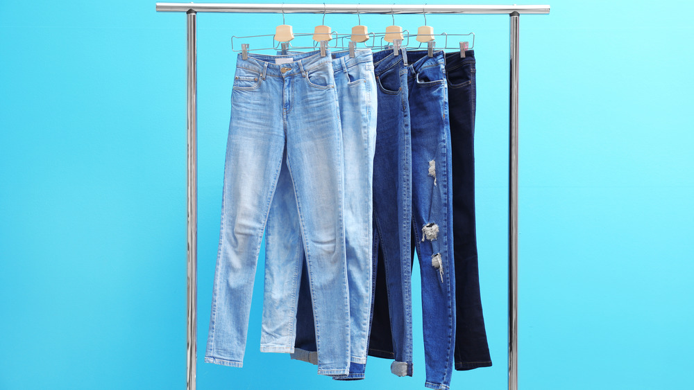 Jeans hanging on a rack