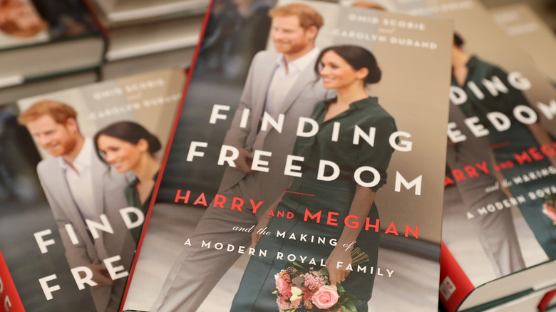 "Finding Freedom" books stacked on table