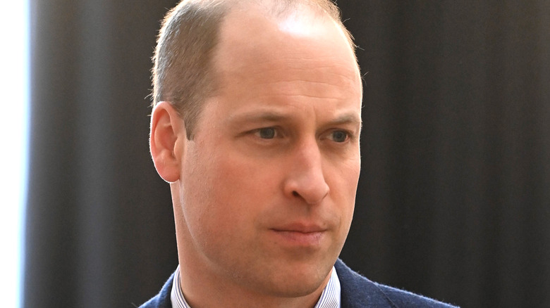 Prince William with pursed lips 