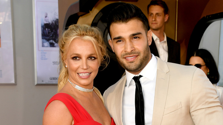 Britney Spears and Sam Asghari smiling 