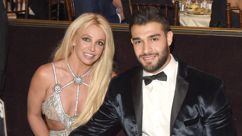 Britney Spears and Sam Asghari smiling 