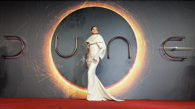 Zendaya posing for a picture at the Dune premiere