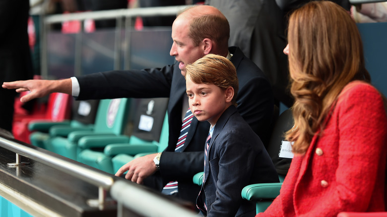 Prince George with his parents