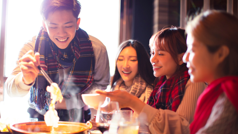 Family eating in the winter