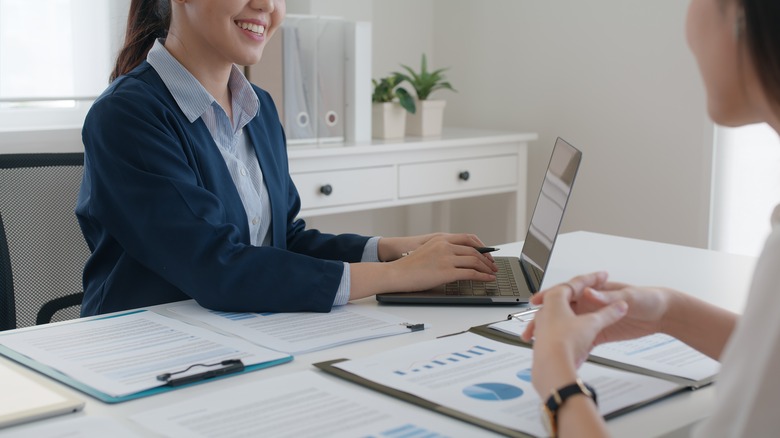 woman discussing finances with professional