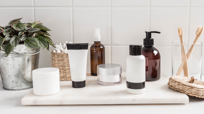 Skincare products on bathroom counter