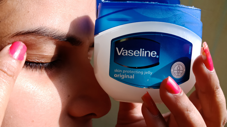 Woman using vaseline