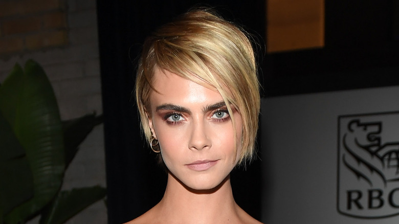 Cara Delevingne with a pixie cut