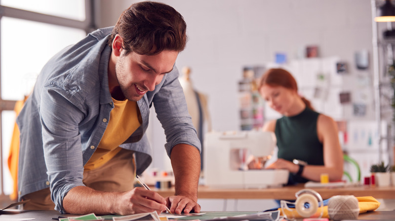 Fashion interns in workroom