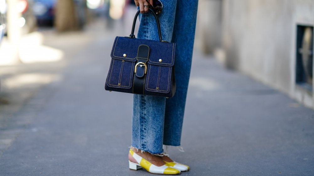 Woman in jeans with denim purse