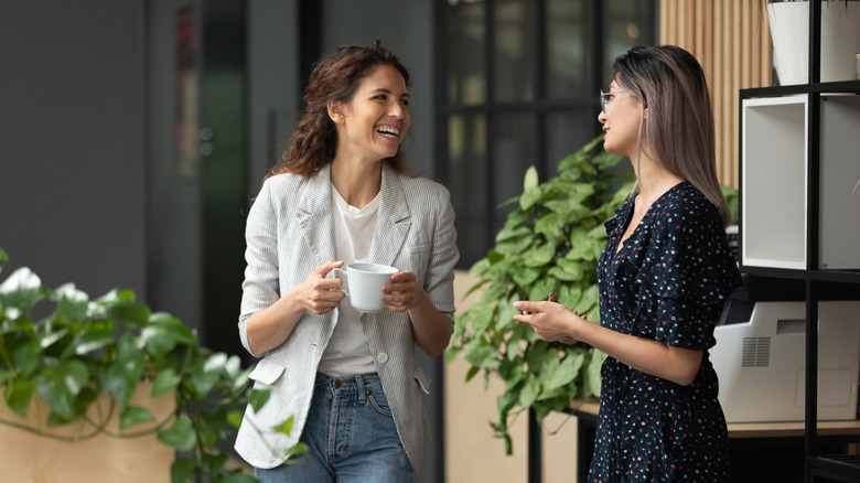 Women laughing and talking