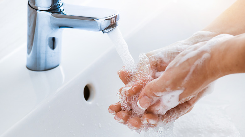 Person washing hands