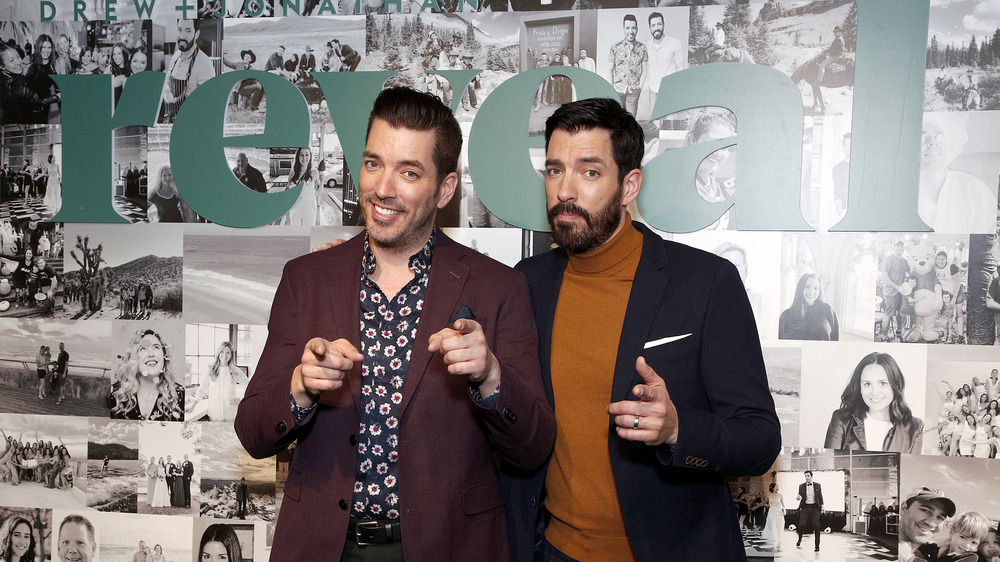 Jonathan and Drew Scott pointing at the camera