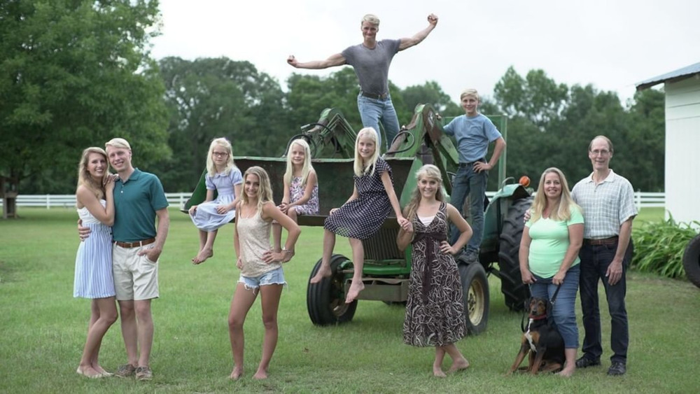 The Plath family posing outside