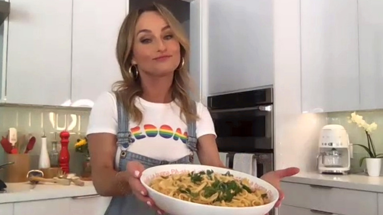 Giada De Laurentiis holding bowl of pasta