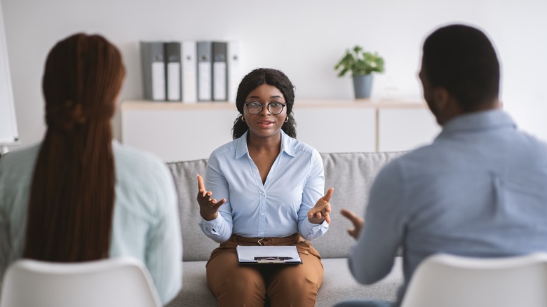 couple talking to a therapist