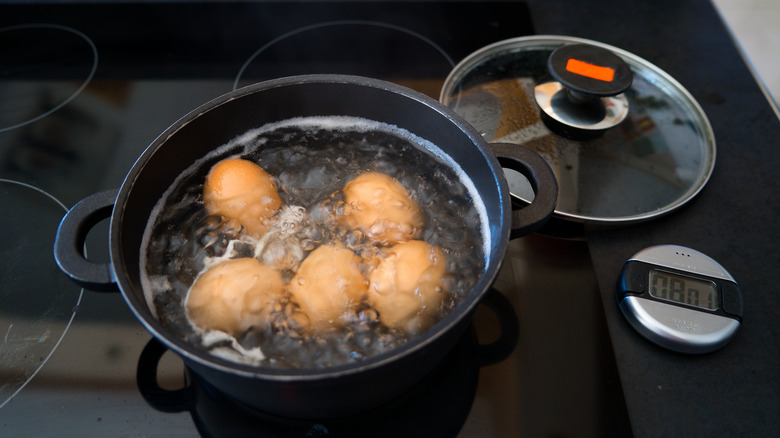 Hard-boiled eggs in a pot on the stove