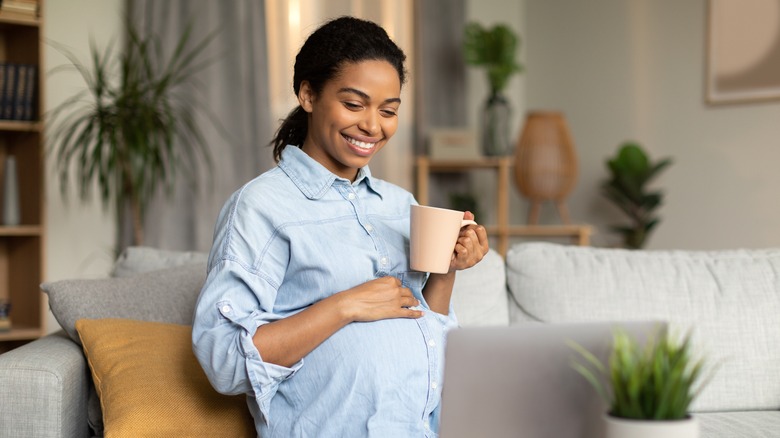 Pregnant woman on computer