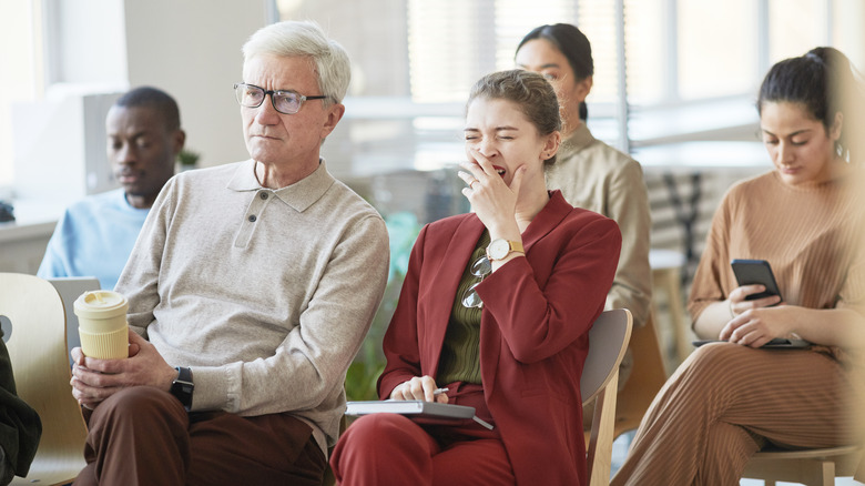 Woman yawning during a talk