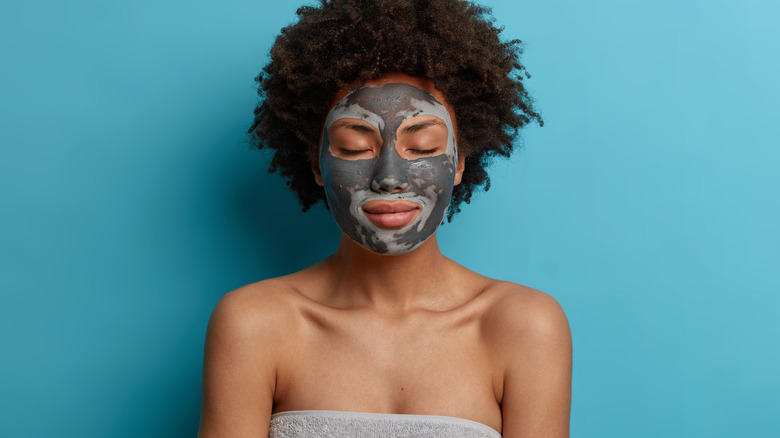 woman wearing clay mask