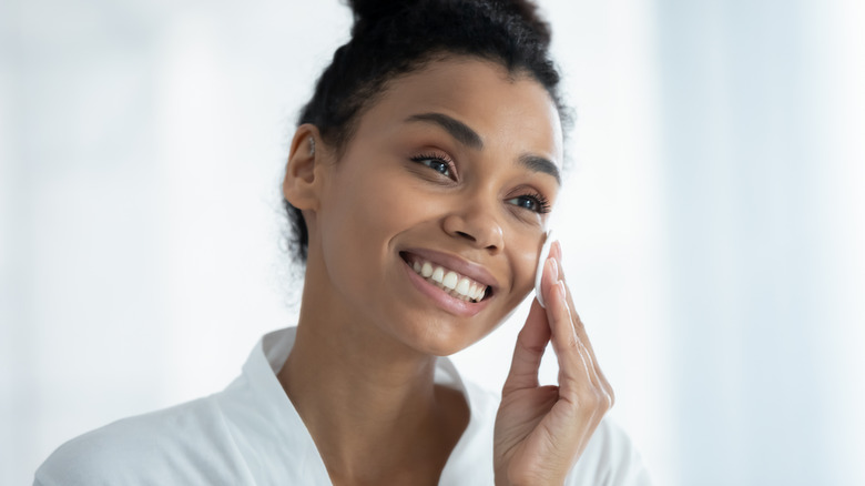 woman washing face