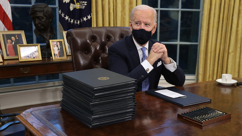 Joe Biden in Oval Office wearing mask