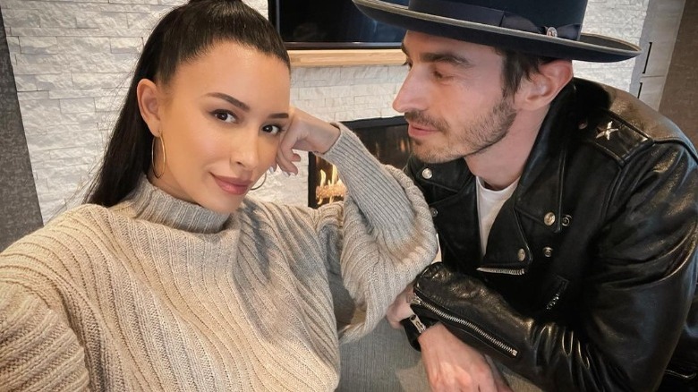 Christian Serratos poses with her partner 